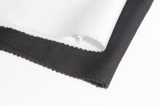 100% Polyester Gaoxin Woven Fusible Tricot Knitted Woven Fusible Interlining Durable